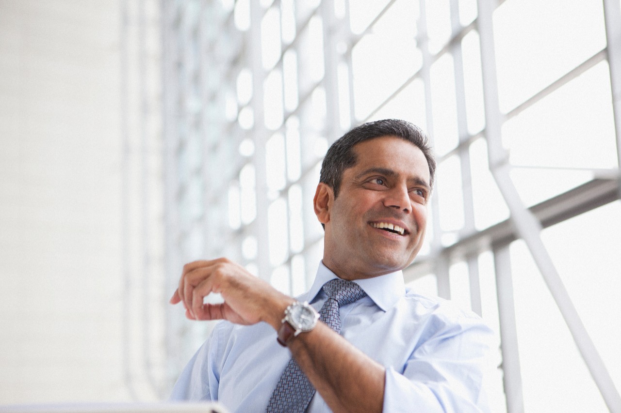Smiling businessman, office, individual, executive, brightly lit, man
