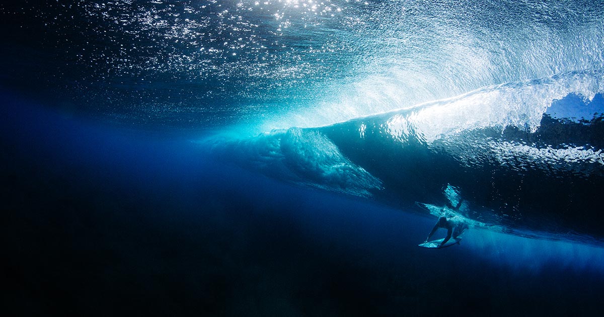 Man diving under a wave, surfing, surf, water, beach