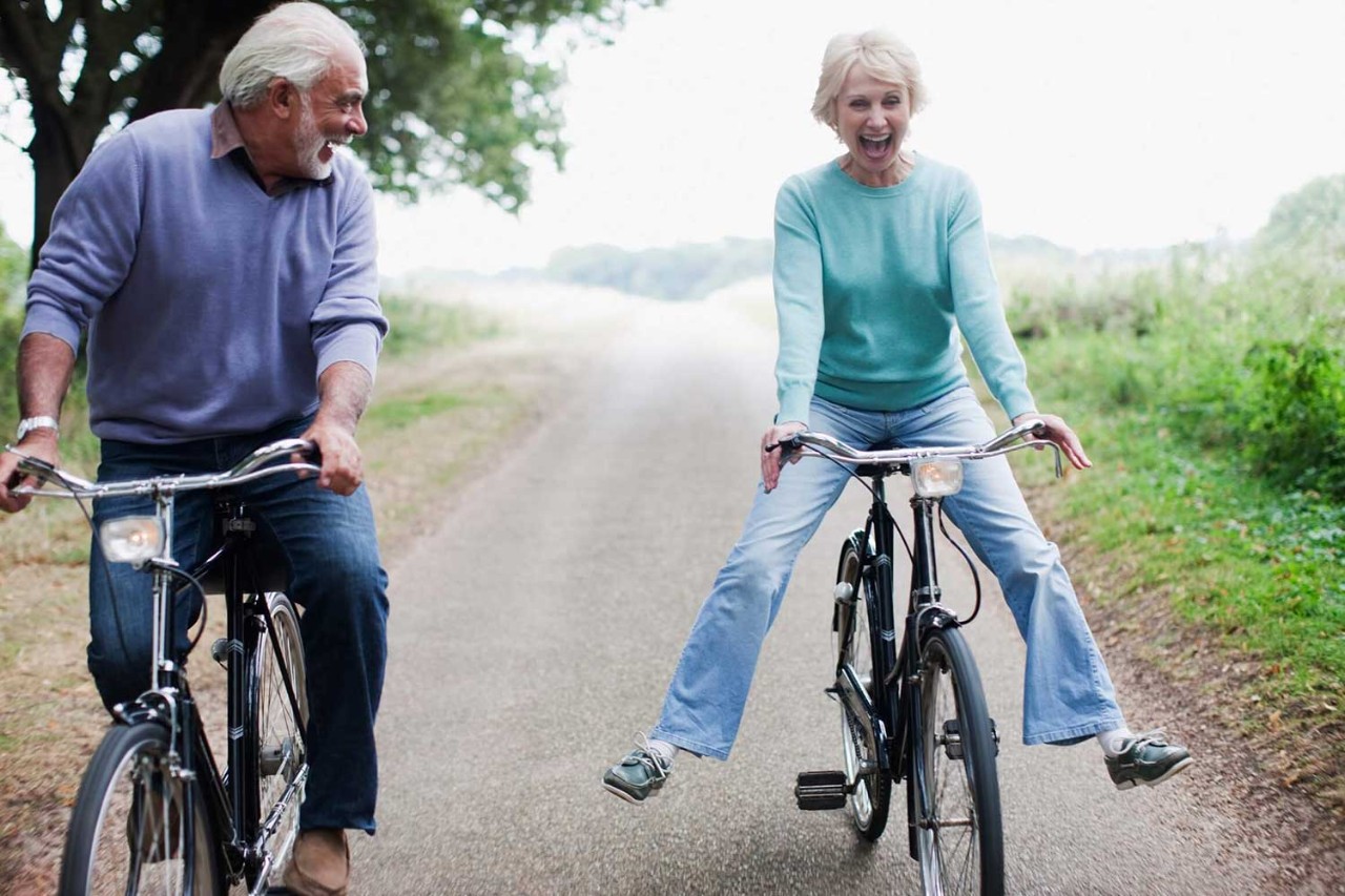 Man and woman riding bicycles