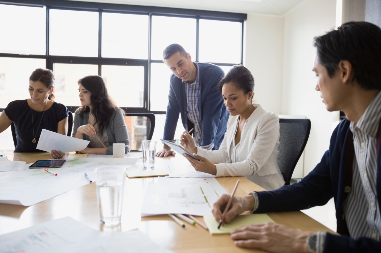 Architects working in conference room